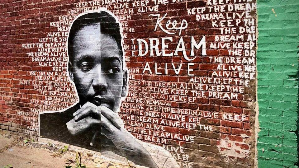 Mural depicting community resilience and the dream of justice